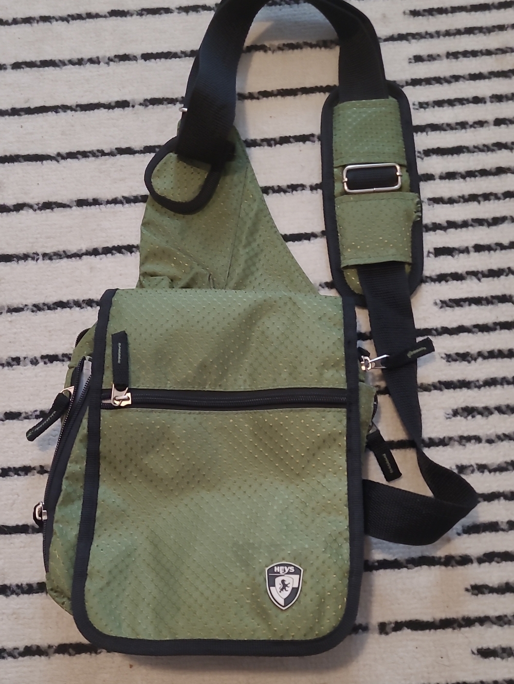 HEYS Olive Green Sling Messenger Bag with Adjustable Strap
